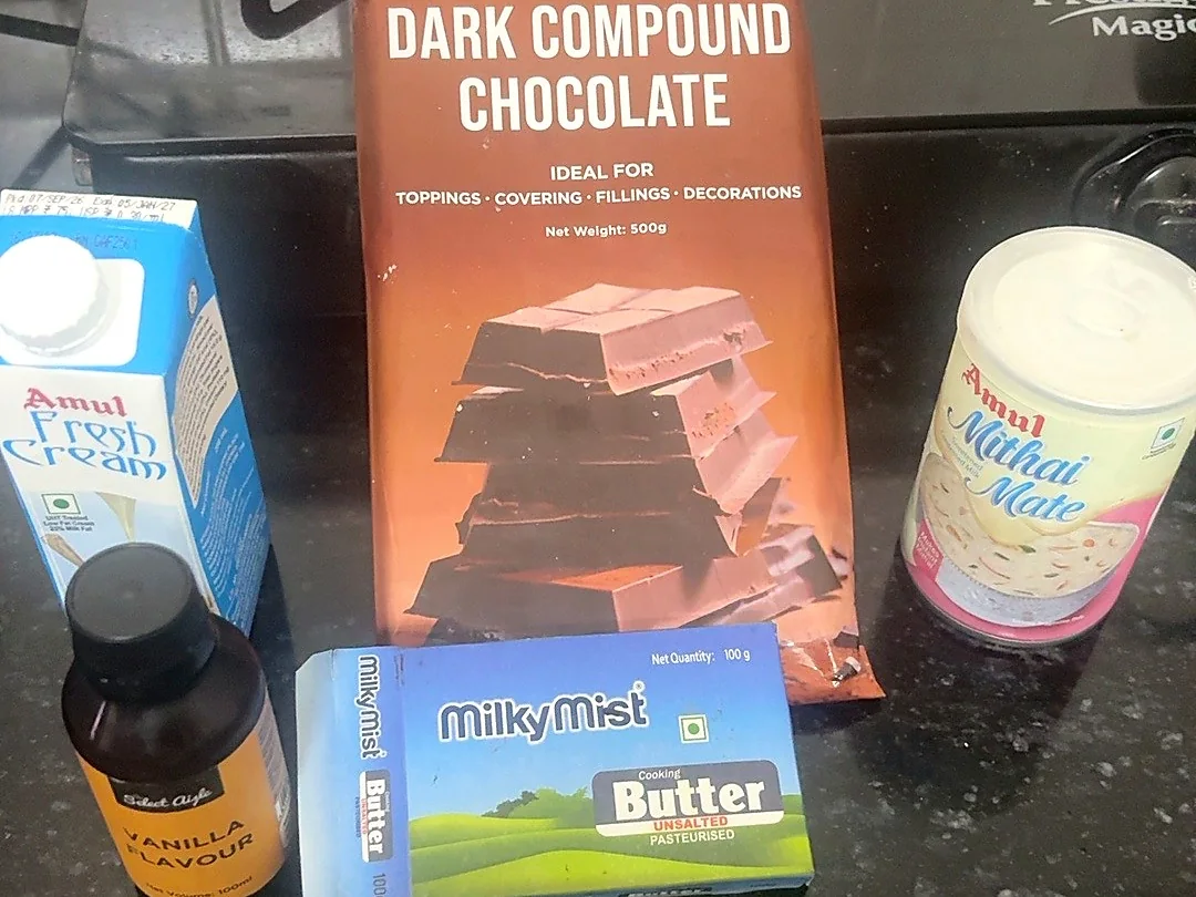 Dark compound chocolate, Amul Fresh Cream, Amul Mithai Mate and Milky Mist butter used for the cake